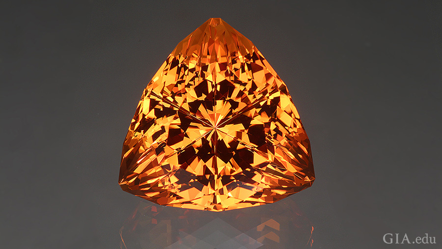 The November birthstone is shown off with a fantasy cut that unleashes the fire within this 43.49 carat orange citrine. The November birthstone is shown off with a fantasy cut that unleashes the fire within this 43.49 carat orange citrine.
