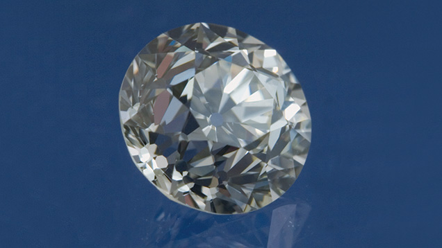 Compared to a modern round brilliant cut, this older-style 1.07-ct. brilliant has a much smaller table (38.5 percent), a higher crown, shorter lower halves, and a much larger culet. Digitally modified image by Al Gilbertson, © GIA, courtesy of Michael Goldstein Compared to a modern round brilliant cut, this older-style 1.07-ct. brilliant has a much smaller table (38.5 percent), a higher crown, shorter lower halves, and a much larger culet. Digitally modified image by Al Gilbertson, © GIA, courtesy of Michael Goldstein