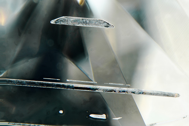 Metallic flux inclusions in the synthetic diamond. Metallic flux inclusions in the synthetic diamond.