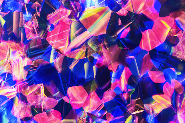 Play-of-color patches are uniformly distributed throughout the plastic opal imitation. Play-of-color patches are uniformly distributed throughout the plastic opal imitation.
