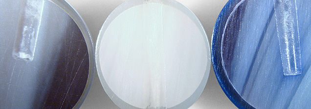 Figure 3. Left to right: Cross sections of an irradiated akoya pearl, a white akoya pearl, and an irradiated and dyed akoya pearl. Photo by Emiko Yazawa; field of view 14.52 mm. Figure 3. Left to right: Cross sections of an irradiated akoya pearl, a white akoya pearl, and an irradiated and dyed akoya pearl. Photo by Emiko Yazawa; field of view 14.52 mm.