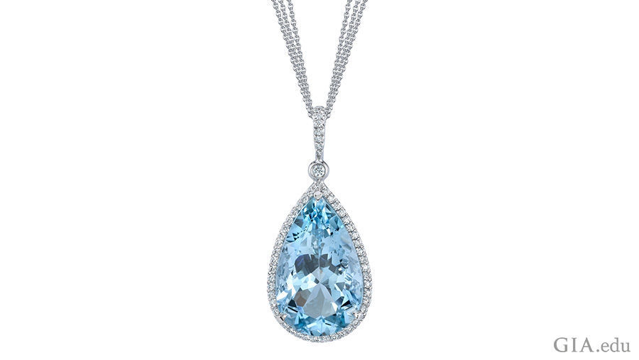 The March birthstone is the focal point of this necklace with a 10.06 carat pear shaped aquamarine surrounded by 72 round diamonds set in platinum.