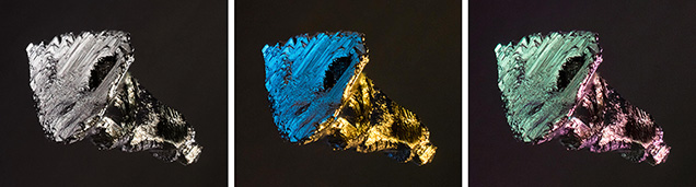 Sulfide inclusion in fluorite seen with Rhineberg illumination.