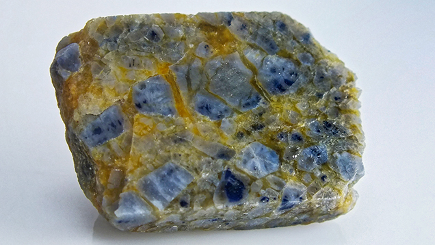 Corundum-bearing rock sample from Sutara, Russia