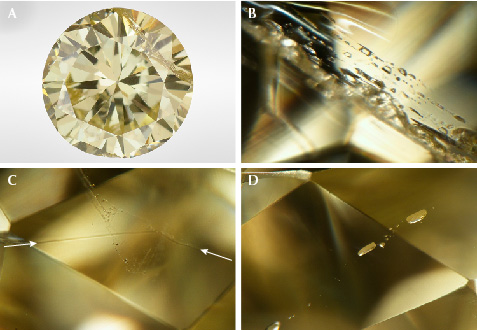 A series of healed fractures with silicate melt inclusions in a yellow diamond.