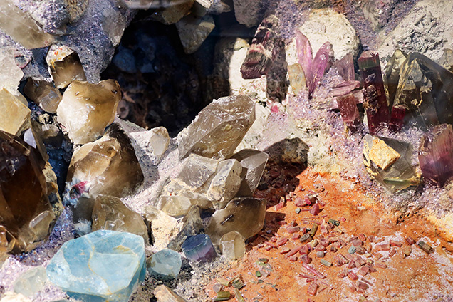 The “Miner’s Fantasy Mine” gem pocket replica highlights various gems and minerals mined in San Diego County.