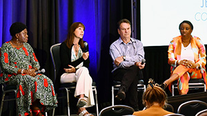 Figure 1. Pauline Mundia, Susan Wheeler, Eric Braunwart, and Ola Erogbogbo-Oyeniyi discuss working with gem traders in source countries. Photo courtesy of RJT.