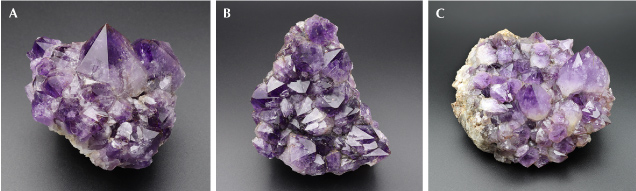 Figure 5. Amethyst from La Manche. A: 9 cm wide with the largest crystal 4 cm tall. B: 11 cm wide. C: Medium purple amethyst, with the largest crystal measuring 4 cm wide. Photos by Philippe Belley.