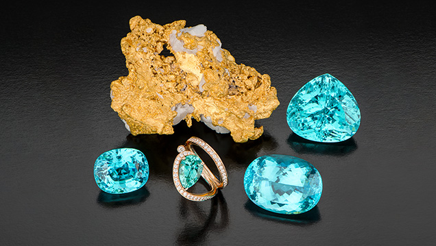 Paraíba-type tourmalines from Mozambique alongside gold nugget.