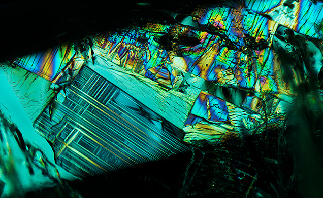 Flux-filled fractures in YAG resemble stained glass.