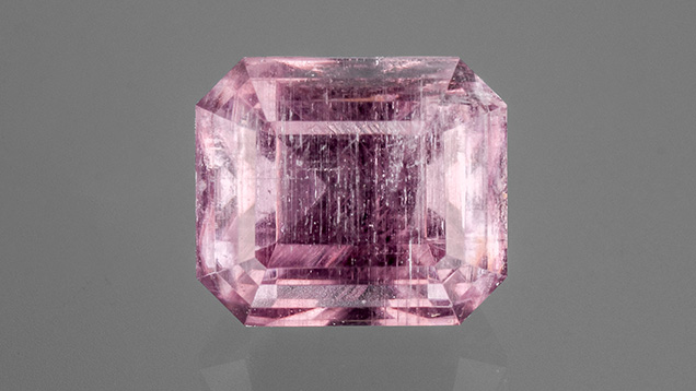 Figure 1. This 2.13 ct purple stone was identified as the rare collector gem anhydrite. Photo by Adrianna Gudino.