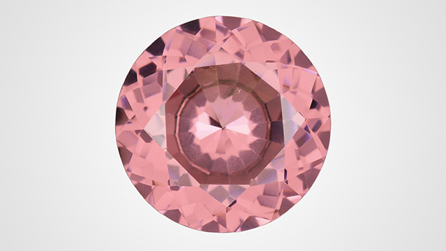 A 7.26 ct modified round brilliant identified as pink pyrope garnet. Photo by Towfiq Ahmed; courtesy of Bill Vance.