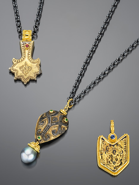 Figure 2. Three ancient artifacts repurposed by Zaffiro. Top left: Medieval silver-gilt strap end from the thirteenth to fifteenth century, set in granulated 22K yellow gold with a 0.07 ct red spinel. Center: Gilded bronze medieval mount from the twelfth to fourteenth century, set in 22K granulated and 18K yellow gold with 0.15 carats of tsavorite garnet and an 11.5 × 14.0 mm black Tahitian pearl. Bottom right: Gilded bronze belt mount from the tenth to twelfth century, set in granulated 22K yellow gold with a 0.13 ct blue sapphire. Photo by Robert Weldon; courtesy of Zaffiro.