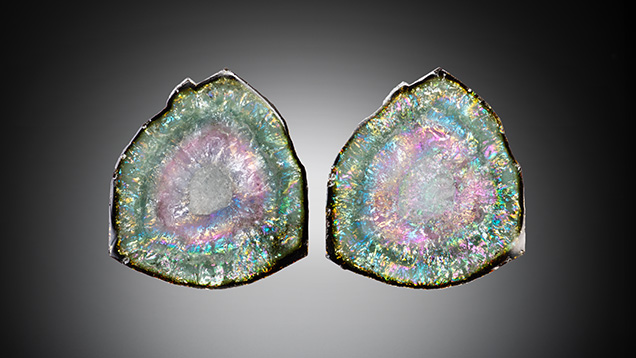 These 18 × 18 × 4 mm watermelon tourmaline slices (17.82 ct on the left and 17.17 ct on the right) display an exceptional iris effect. Photo by Jeffrey Scovil.