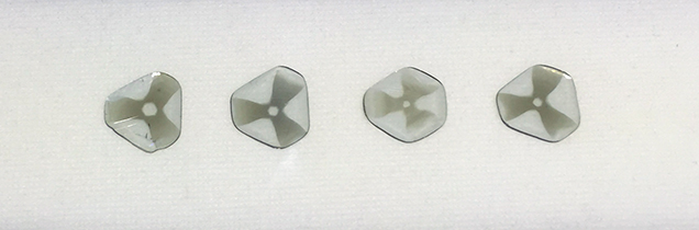 Diamond slices showing a “trapiche” pattern.