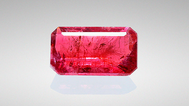 This emerald-cut red beryl weighs 0.22 carats.