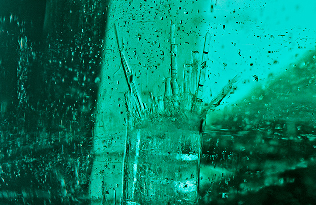 Cluster of bamboo-shaped apatite crystals in a Zambian emerald.