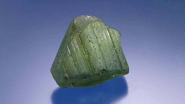 Figure 11. A 69.30 g (346.5 ct) peridot crystal from Zabargad (Saint John’s) Island in the Red Sea. Photo by Robert Weldon.