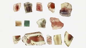 Figure 1. The 29 natural labradorite sunstone and plagioclase feldspar specimens used in this study. Groups A and C are from Oregon, United States; group B is from Inner Mongolia, China; and group D is from Afar, Ethiopia. In Group C, the top five stones are from the Ponderosa mine, the middle three samples (first one imaged in two orientations) are from the Sunstone Butte mine, and the bottom five samples are from the Dust Devil mine. Photos by Qingchao Zhou.