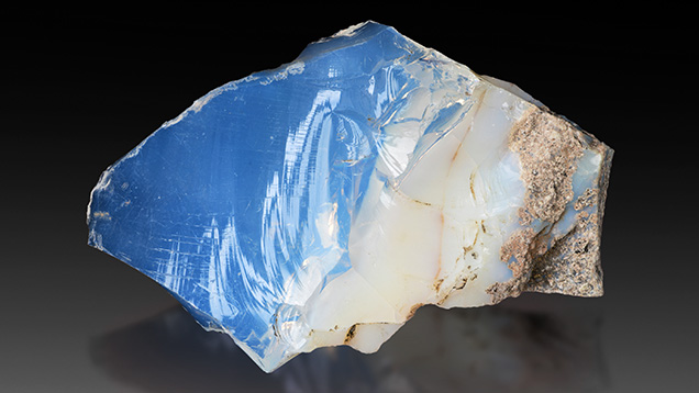 Figure 8. Glassy and milky common opal (42 × 28 × 17 mm). Photo by Albert Russ; courtesy of Great Rent JSC.